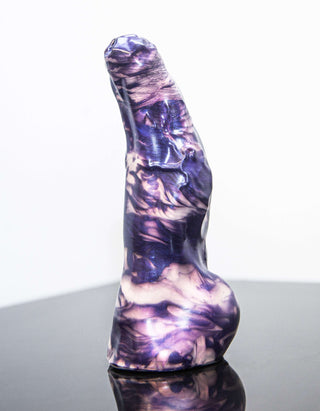 A smaller Keith the Yeti dildo with girth changes displayed on a black surface, created by Fantastic Kreations.