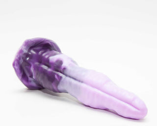 Stranger Things 8 the Demogorgon dildo in laying down. All of our sex toys are made from 100% platinum cure silicone.