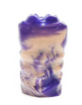 A Parvus the Masturbator from Fantasticocks, a purple male masturbator, on a white surface.