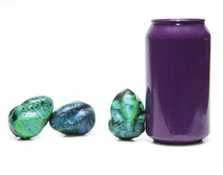 We use a soda can to compare sizes for all of our sex toys, shown here is Alien Kegel Eggs