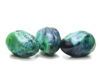 Here is the front side of our Alien Kegel Eggs. We strive to be an all inclusive shop offering a wide variety of handmade sex toys and transgender affirming products. 