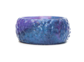 Textured surface of the FantastiCock Cock Ring in purple and blue