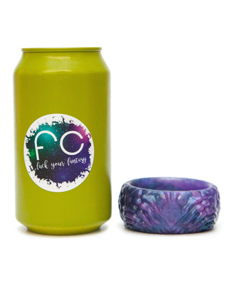 FantastiCock Cock Ring with purple accents next to a standard soda can for size reference