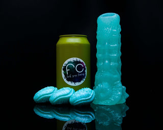 We use a soda can to compare sizes for all of our sex toys, shown here is Aquarius the Kelpie Ovipositor with Kelpie Kegel Eggs.